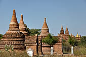 The cluster of red brick temples, named Khay-min-gha on the map on the North plain of Bagan. Myanmar. 